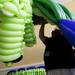 An audience member helps maneuver the balloon dragon before destruction on Sunday. Daniel Brenner I AnnArbor.com